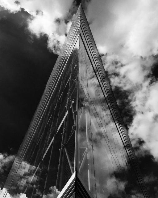 Abstract Skyscraper with Dramatic Clouds Reflection - Download Free Stock Images Pikwizard.com