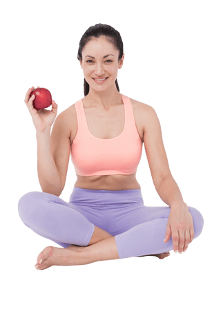 transparent fit woman holding apple sitting cross-legged - Download Free Stock Videos Pikwizard.com