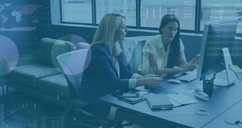 Businesswomen Collaborative Meeting in Modern Office Environment