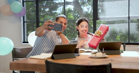 Business Colleagues Celebrating in Decorated Office
