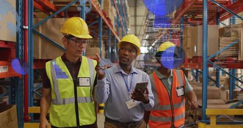 Warehouse team using tablet and augmented reality for inventory inspection