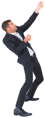 Confident businessman in suit with hands raised, white background