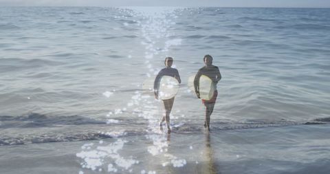 Joyful African American Couple with Surfboards by the Sea - Download Free Stock Images Pikwizard.com