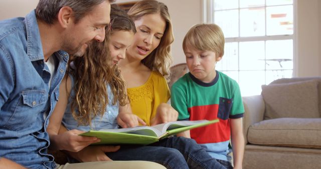 Happy Family Reading Picture Book Together at Home - Download Free Stock Images Pikwizard.com