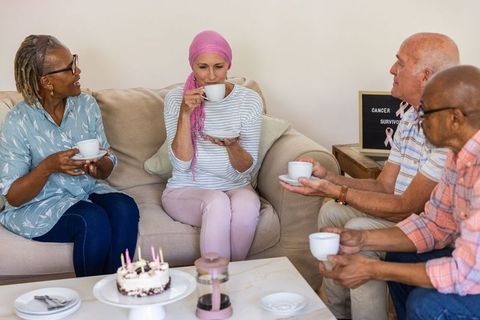 Diverse support group enjoying friendly gathering at home