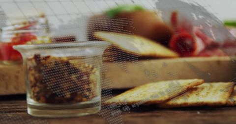 Gourmet crackers with rustic spread on wooden table