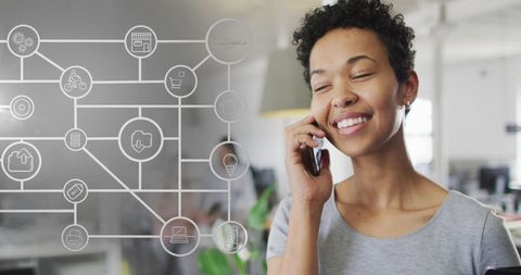 African american businesswoman talking smartphone network icons