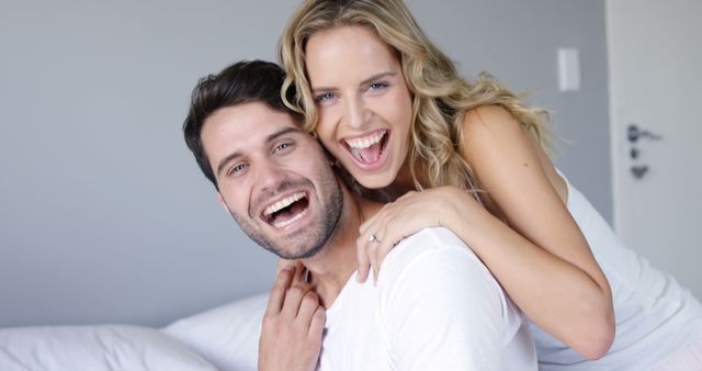 Cute couple embracing in bedroom - Download Free Stock Photos Pikwizard.com