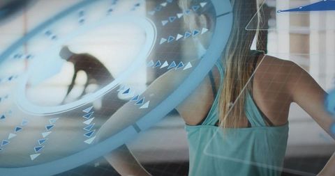 Woman watching virtual fitness hud overlay while training, futuristic workout interface