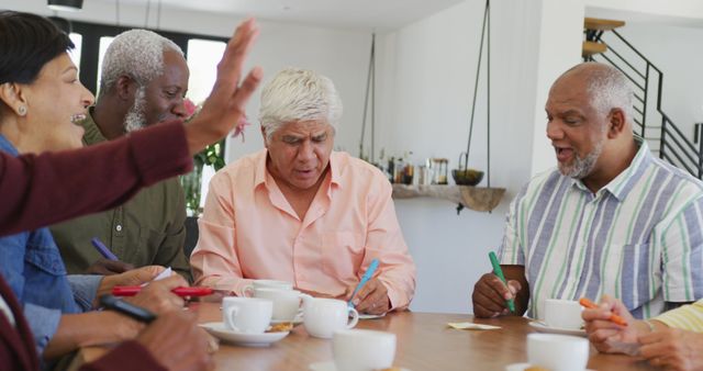 Diverse Seniors Participating in a Group Brainstorming Session - Download Free Stock Images Pikwizard.com