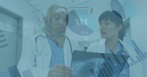 Diverse Female Doctors Analyzing Advanced Medical Data