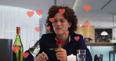 Romantic Virtual Date: Man Enjoys Virtual Connection with Glass of Wine and Rose - Download Free Stock Images Pikwizard.com