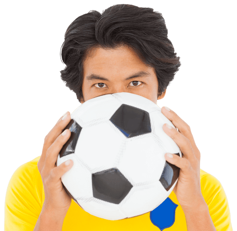 Transparent soccer player holding football focused stare