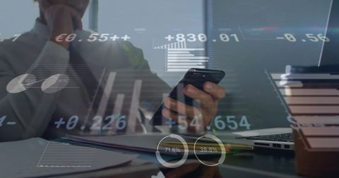 Businessman analyzing financial data on smartphone device