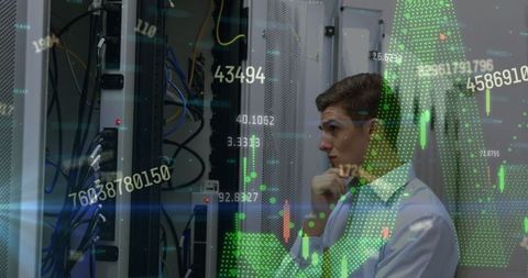 Data analyst managing connectivity in server room environment