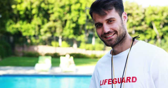 Smiling Lifeguard at Poolside During Summer Day - Download Free Stock Images Pikwizard.com