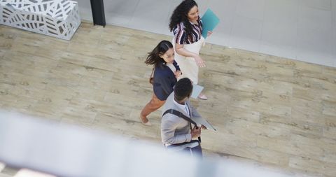 Diverse team discussing together in modern office