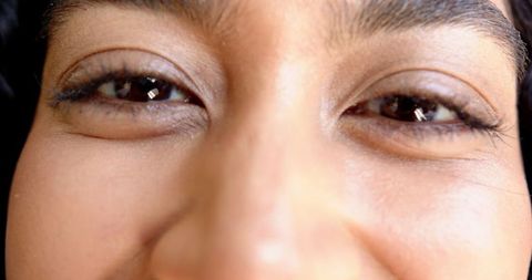 Close-Up of Smiling Man Character Radiating Serenity and Intensity
