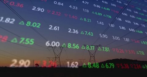 Transmission Towers at Dusk with Overlay of Stock Market Data