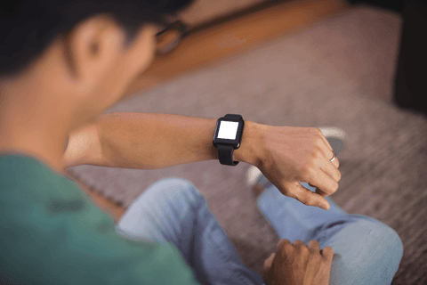 man checking notifications on transparent smartwatch at home - Download Free Stock Videos Pikwizard.com
