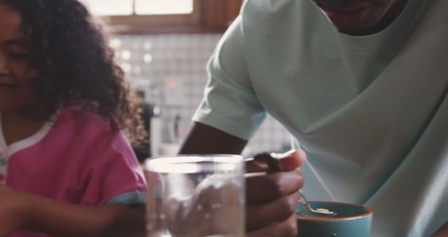 Father and Daughter Having Breakfast in Kitchen - Download Free Stock Images Pikwizard.com