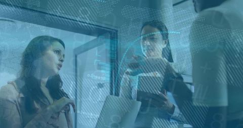 Innovative Businesswomen Collaborating in Digital Office