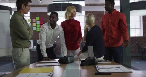 Diverse Team Collaborating on Innovative Ideas in Modern Office