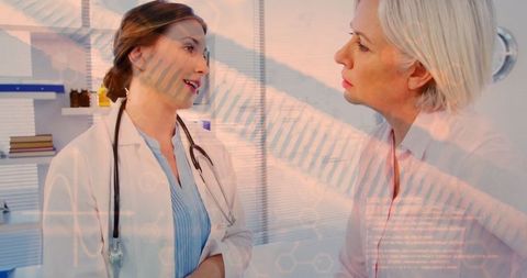 Female doctor advising patient in clinical consultation