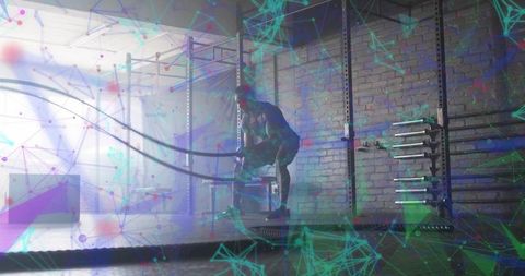 Dynamic Battle Rope Workout in Industrial Gym Setting