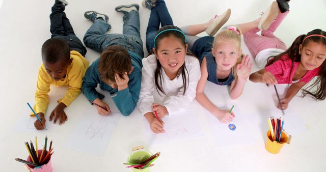 Diverse Children Drawing and Coloring Together on Floor - Download Free Stock Images Pikwizard.com