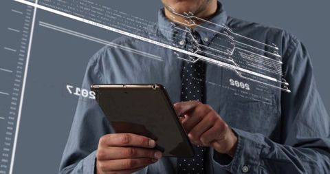 Businessman holding tablet and tapping HUD for data analytics and augmented interface