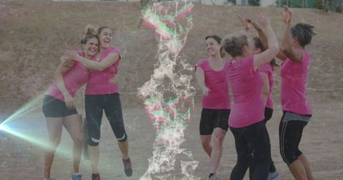 Women Teammates Celebrating Unity Outdoors in Pink Sportswear
