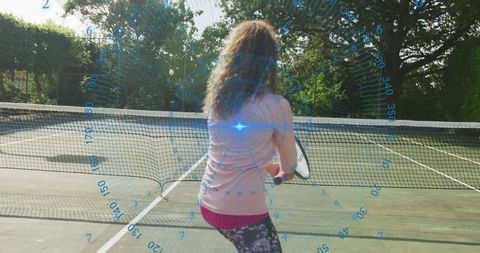 Woman Practicing Tennis with Innovative HUD Technology