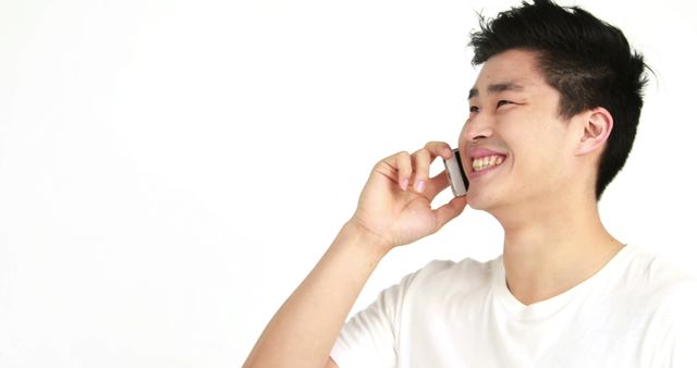 Smiling Man Talking on Smartphone against White Background - Download Free Stock Images Pikwizard.com