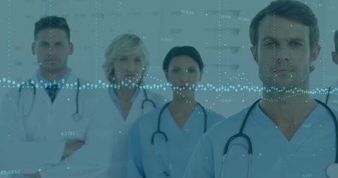 Diverse healthcare team in hospital with digital data overlay