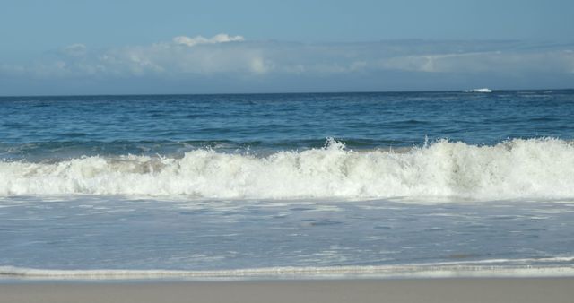 Calm Ocean Waves Hitting Sandy Beach on Sunny Day - Download Free Stock Photos Pikwizard.com