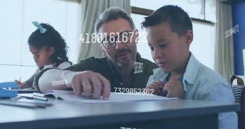 Mature teacher guiding elementary student through worksheet with digital number overlays