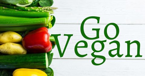 Inspiring Go Vegan Message with Fresh Vegetables Background - Download Free Stock Images Pikwizard.com