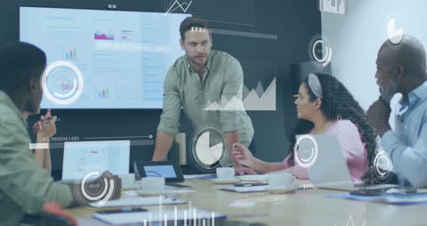 Diverse Team Analyzing Data Analytics in Modern Office Setting