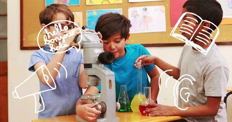 Children conducting hands-on science experiment with microscope and colorful lab glassware