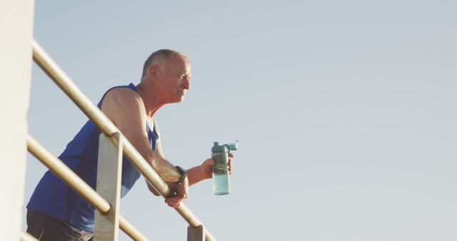 Senior Man Hydrating after Outdoor Exercise on Sunny Day - Download Free Stock Images Pikwizard.com