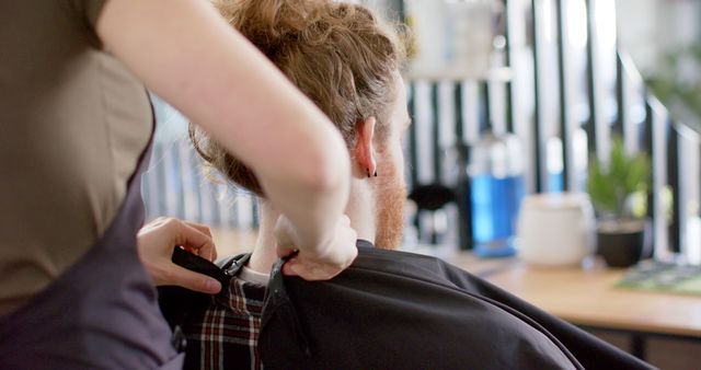 Professional Barber Preparing Client for Haircut - Download Free Stock Images Pikwizard.com