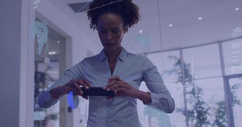 Professional Woman Utilizes Smartphone for Data Processing