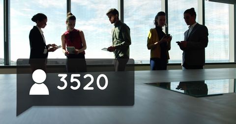 Business Team Analyzing Data and Growth Indicators in Modern Office