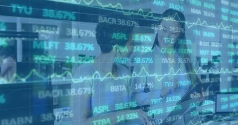 Businesswomen Analyzing Financial Data with Charts Overlay