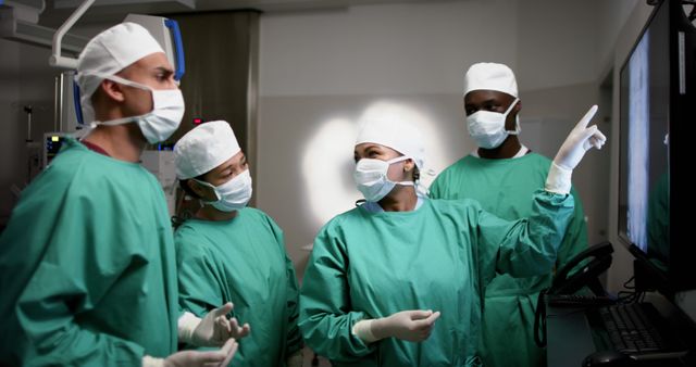 Diverse Medical Team Reviewing X-Ray During Surgery - Download Free Stock Images Pikwizard.com