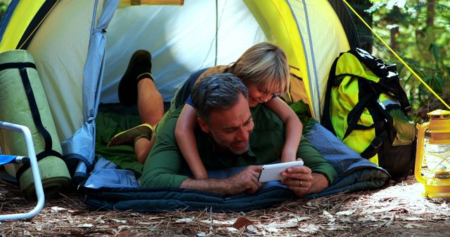Father and Daughter Enjoying Camping in Tent - Download Free Stock Images Pikwizard.com