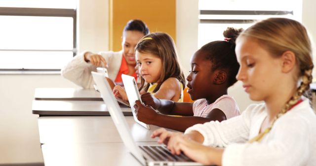 Diverse Group of Children Using Devices in Modern Classroom - Download Free Stock Images Pikwizard.com