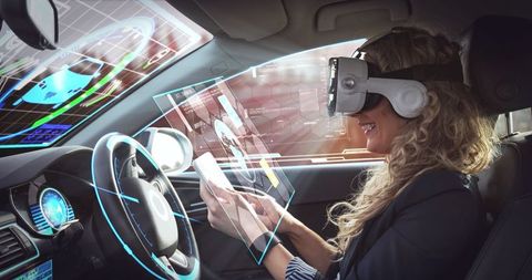 Woman Using Virtual Reality in Self-Driving Car - Download Free Stock Images Pikwizard.com