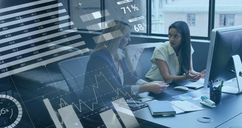 Business Professionals Discussing Financial Strategy in Modern Office